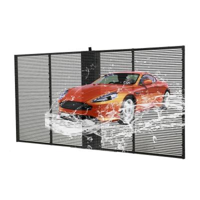 China Indoor and semi-outdoor curtain window TV advertising glass led indoor outdoor p3.91transparent led mesh screen for sale