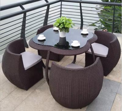 China Modern Modern Rattan Dining Table Chairs Rattan Set Outdoor Garden Set Patio Furniture Dining Set for sale