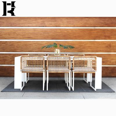 China Outdoor dining wicker dining table and chairs patio armchair aluminum dining table modern home furniture luxury modern hotel furniture for sale