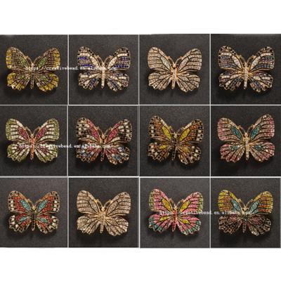 China 2021 Fashionable high quality fabric decoration rhinestone butterfly brooch gold colors women bridal wedding dress brooches for sale