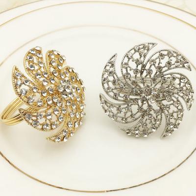 China Viable Metal Rhinestone Napkin Ring Holder Sun Shape Napkin Ring For Wedding Decoration for sale