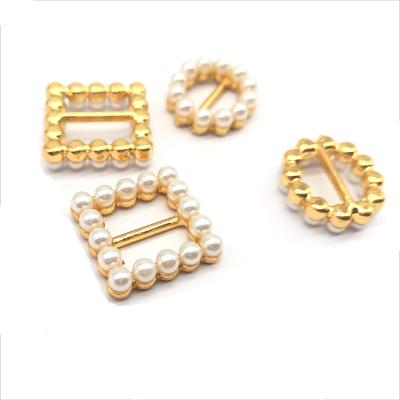 China Gold and pearl alloy suspender buckles bags for bridesmaid dresses design for sale