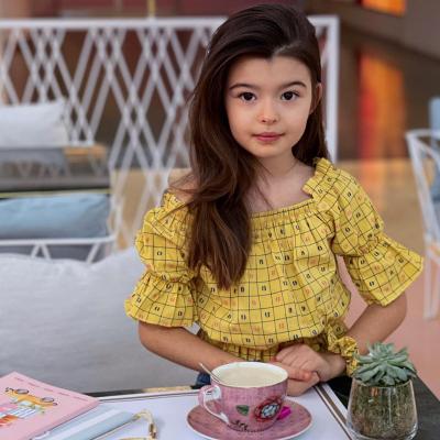 China Spandex / Bamboo Fiber Knitted Summer Outdoor Kids Tops Are A Hot Seller For Girls' Clothes With Yellow Prints for sale