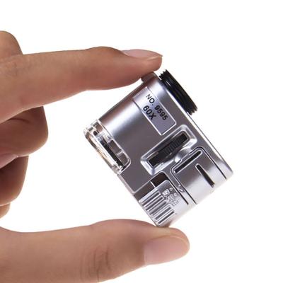 China For Currency NO.9595 60X Mini Pocket Microscope with LED UV Light for sale