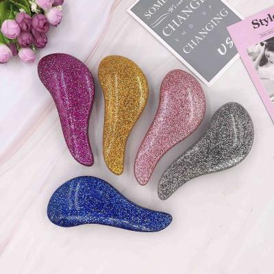 China Glitter Handle TT Comb Extension Portable Instant Magic Hair Brush Tangled Hair Brush for sale