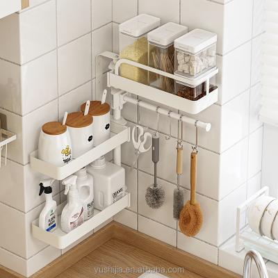 China Yushijia New Design Viable DIY Design Hook Cutlery Rack Storage Kitchen Wall Mount Spice Rack Rotating Organizer for sale