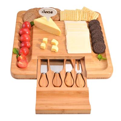 China OEM Cheese Board and Sustainable Bamboo Knife Set / Wooden Charcuterie Tray and Meat and Cheese Serving Board with Slide-out Drawer for Cutlery for sale