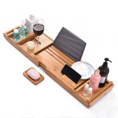 China Sustainable Bamboo Bathtub Caddy Adjustable Handcrafted Bath Tray With Reading Rack Bath Tub Tray for sale