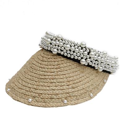 China New design picture raffia sun visor hat female handmade empty top straw hat pearl travel outdoor beach hat for sale