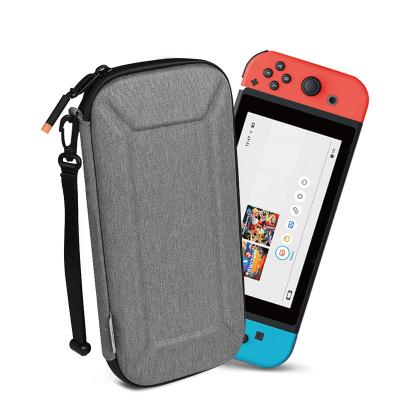 China Lightweight Shockproof Waterproof Travel Bag WiWU Slim Ultra Carry Case For Switch Hard Shell With Game Cartridges Protective Carrying Case For Daily Travel Use for sale