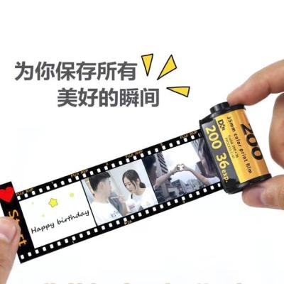 China Plastic Customize Mother's Day Photo Roll Key Chain Film Key Chain With 10 Photos for sale