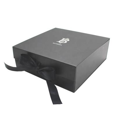 China Recyclable Custom Flat Folding Gift Packaging Present Cheap Hard Cardboard Box With Black Ribbon for sale