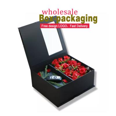 China Pretty design recyclable personalized book shaped rose flower packaging cardboard boxes with pcv window for sale