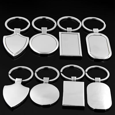 China Cheap Custom Laser Engraved Fashional Logo Metal Sublimation Blank Keychain Souvenir Gifts Laser Printing for sale