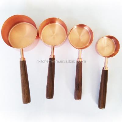 China Sustainable 4PCS Stainless Steel With Copper Measucing Cup Set With Wooden Handle for sale