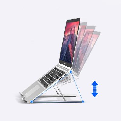 China Foldable Aluminum Alloy Base Notebook Metal Bracket Folding Laptop Cooling Stand for sale