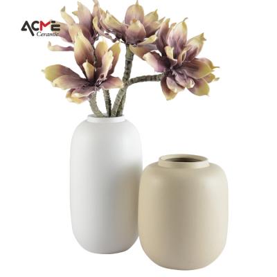 China Modern Nordic Minimalist Decor Artwork Ceramic Table Ornaments Cobblestone Oval Shape Matt Ceramic Flower Vases Decoration for sale