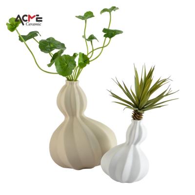 China Creative Home Decoration Matte White Glazed Porcelain Flower Vase Modern Minimalist Tabletop Squash Shape Ceramic Vase for sale