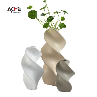 China Nordic modern simple thin ceramic ware vases flower vase spiral shape creative ceramic ware vases tabletop vase for sale