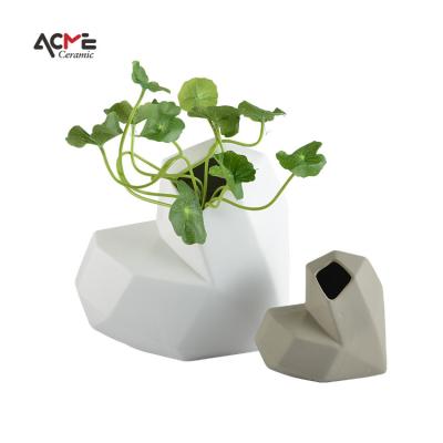 China Nordic modern fashion custom made high quality home decor ware style heart shaped flower vases ceramic ornaments for sale