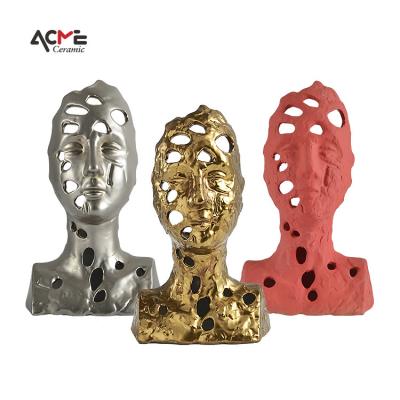 China Nordic Home Ceramic Sculpture Abstract Crafts China Desktop Humanoid Golden Hollow Ornaments for sale