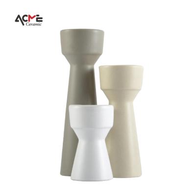 China Unique Modern Custom Wedding Matte White Circle Ceramic Candlestick Home Decor Table Decor Candle Holder Black for sale