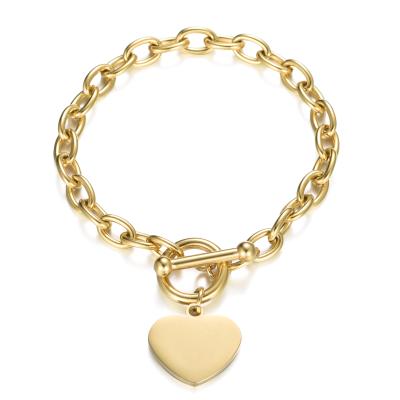 China Environmental Friendly 18K Gold Plated Stainless Steel Link Chain Toggle Clasp White Heart Charms Bracelets For Women for sale