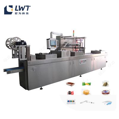 China Fish Food Vacuum Packing Machine Automatic Filling Sealing Packing for sale