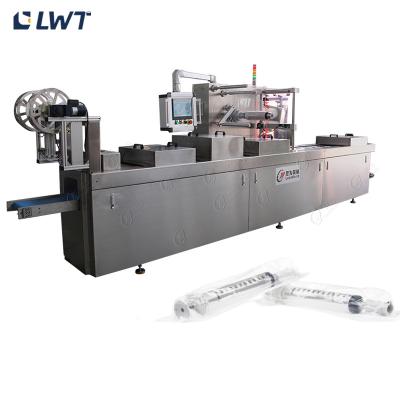 Китай Automatic Stretch Film Thermoforming Pack Syringe Vacuum Packaging Machine продается