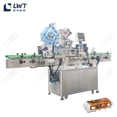 China Automatic Plane Automatic Labeling Machine For Egg Carton for sale