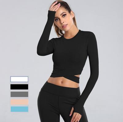 China Breathable Custom Cross Crop Yoga Wear Gym Long Sleeve Top Fit Design Women Sport Shirts With Finger Holes for sale