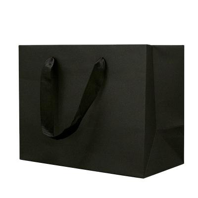 China Recyclable Recycled Paper Shopping Bag Twisted To Handle Flat Paper Rope With Custom Logo for sale