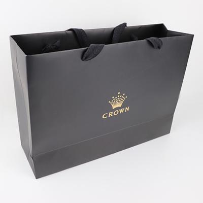 China Recyclable Recycled Cardboard Luxury Paper Custom Gift Bag With Handle For Shopping Bag With Your Own Logo for sale