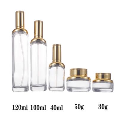 China Personal Care Lotion High Quality Luxury Glass Bottle Clear Glass Cosmetic Set for sale