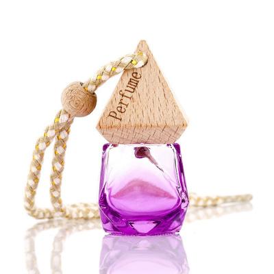 China Hanging Type Perfume Pendant Essential Oil Diffuser Glass Perfume Car Air Freshener Factory Hot Sale Car Bottle for sale