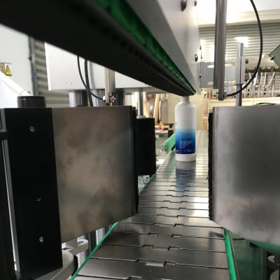 China Npack PLC Control Automatic Two Sides Labeling Machine for Round and Square Plastic Bottles for sale