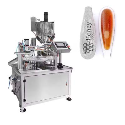 China Automatic High Speed  7g 10g 15g Honey Spoon Filling Machine with PLC Control for sale