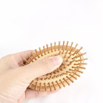 China Comfortable Hot Natural Wood Anti-Static Detangling Egg Massage Brush 360 Wave Sweep Premium Curved Palm Massage Beach Egg Comb for sale