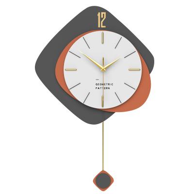 China Modern Light Luxury Antique Style Metal Pendulum Clock Wall Clock With Scale Color MDF Brass Clock Face for sale