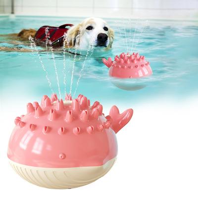 China Summer Electric Pet Toys Stored Durable Tpr Dog Teeth Clean To Grind Chew Toy Swimming Pool Dog Interactive Toys for sale