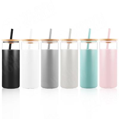 China Sustainable Yekea 500ml Straw Glass Bottle Eco Friendly With Bamboo Lid And Silicone Sleeve for sale