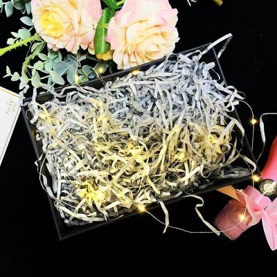 China Recycled Materials 100g Decorative Shiny Raffia PP Shredded Paper For Candy Boxes Filler for sale