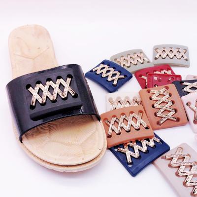 China Simple Design PVC/PP Shoe Buckle Cross Shaped Ladies Shoes Decoration Accessories Shoe Buckle Women for sale