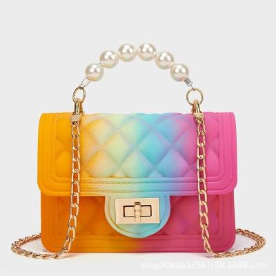 China New cheap small women's handbags high quality gradient color pearl chain exquisite pocket jelly for sale