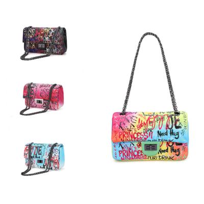 China High quality graffiti bags 2021 designer handbags fashionable famous brands chain purses graffiti printed shoulder bags wholesale graffiti handbag for sale