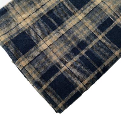 China Plaid Flannel Fabric 260GSM Geometric Jacquard Autumn Winter Polyester Cotton Fabric for sale