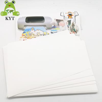 China Cheap custom clothing size A4 heat transfer sublimation laser direct paper heat transfer paper for polyester fabric for sale