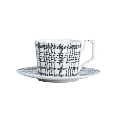 China Sustainable Modern Ceramic Coffee Cup And Saucer Porcelain 6.7 Ounce Tea Cup Set With Pot Fabric Texture for sale