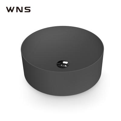 China Modern Sanitary Black Stone Wash Basin Round Cabinet Wash Basin for sale