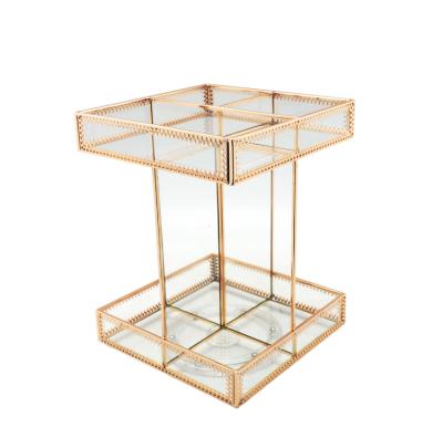 China Viable Classic Desktop Gold Storage Makeup Rotating Glass Cosmetic Organizer for sale